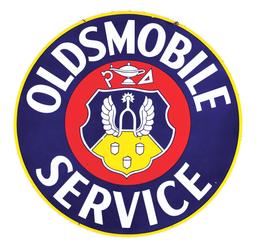 OLDSMOBILE SERVICE PORCELAIN SIGN W/ CREST & LAMP GRAPHIC.