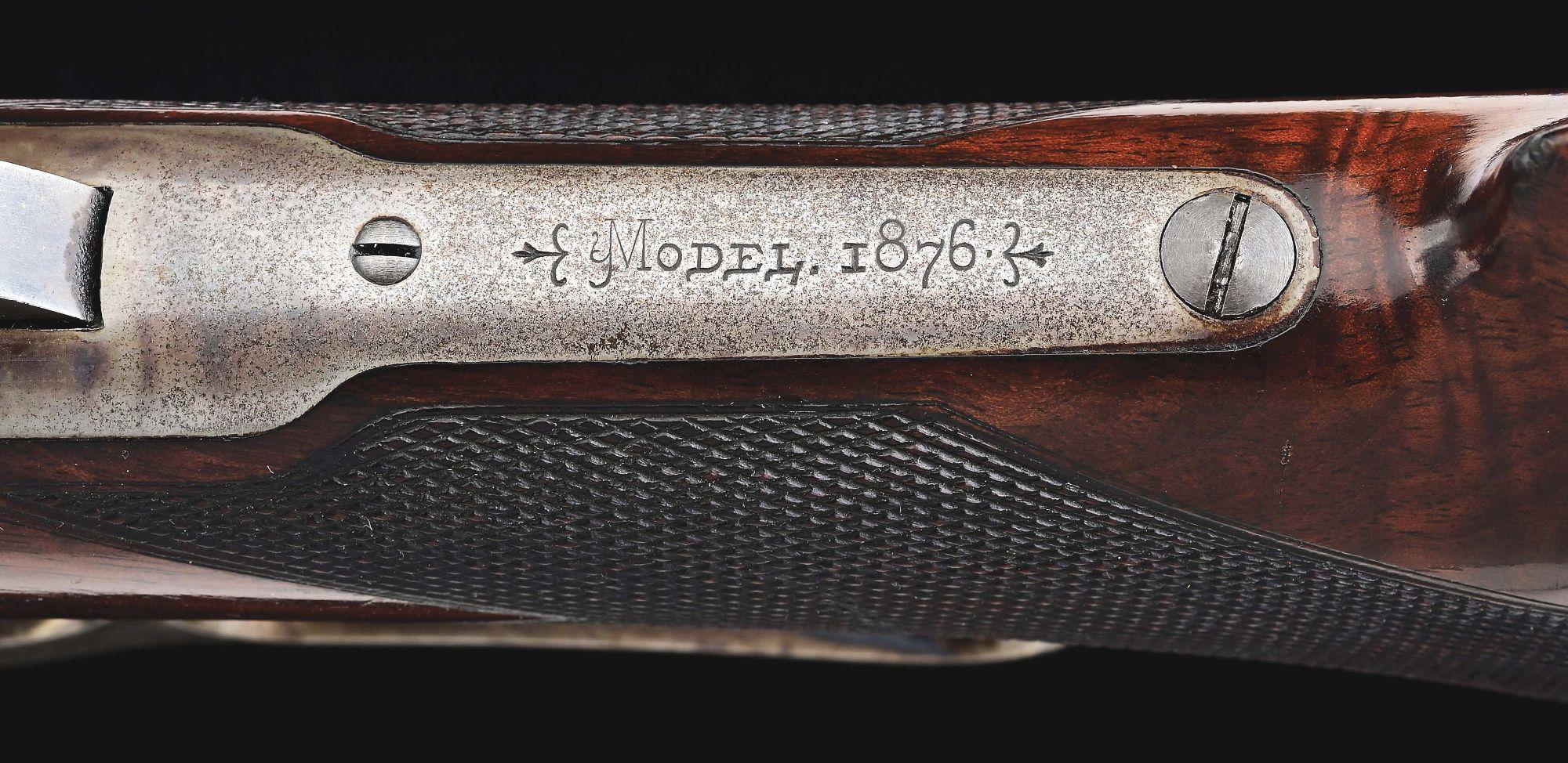 (A) DELUXE WINCHESTER MODEL 1876 LEVER ACTION RIFLE.