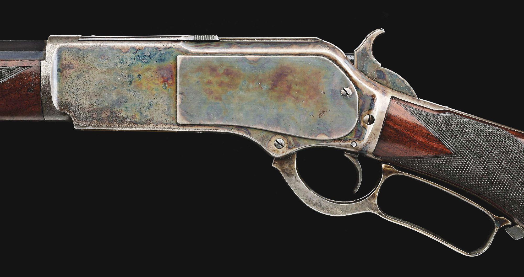 (A) DELUXE WINCHESTER MODEL 1876 LEVER ACTION RIFLE.