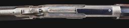 (A) DELUXE WINCHESTER MODEL 1876 LEVER ACTION RIFLE.