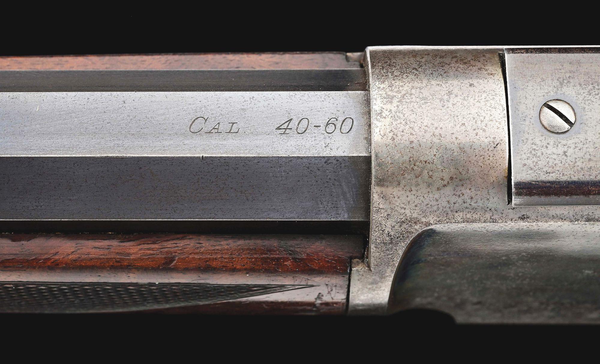 (A) DELUXE WINCHESTER MODEL 1876 LEVER ACTION RIFLE.