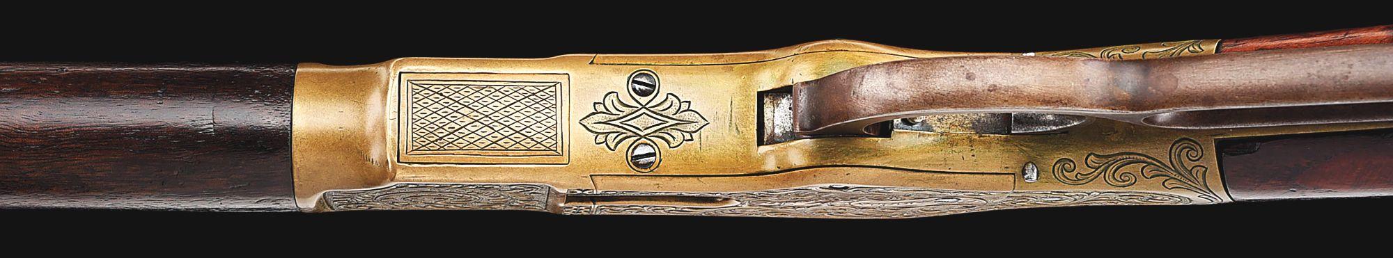 (A) ENGRAVED WINCHESTER MODEL 1866 LEVER ACTION MUSKET.