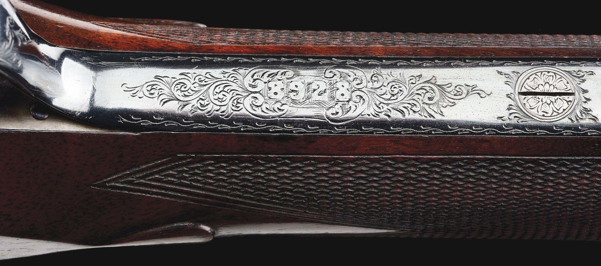 (C) BOSS & CO. OVER/UNDER 12 BORE SHOTGUN.