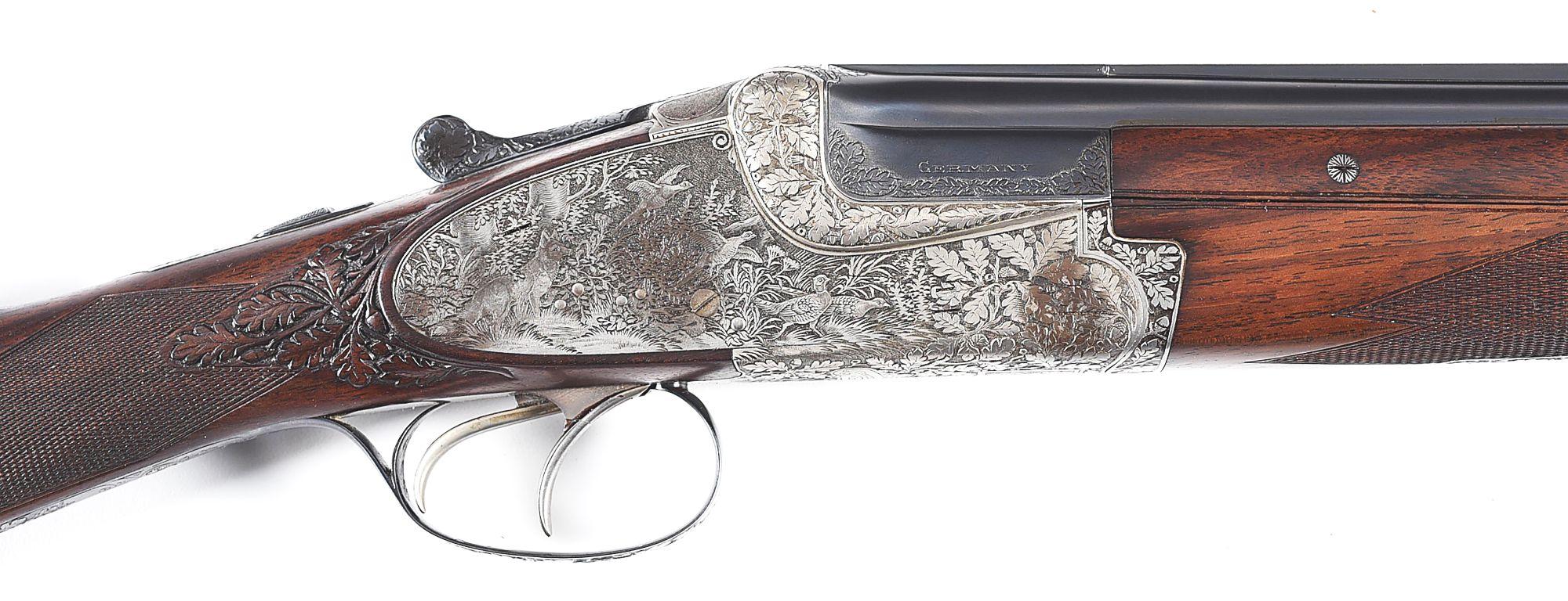 (C) GEBRUDER MERKEL MODEL 304E 20 GAUGE OVER UNDER SHOTGUN.