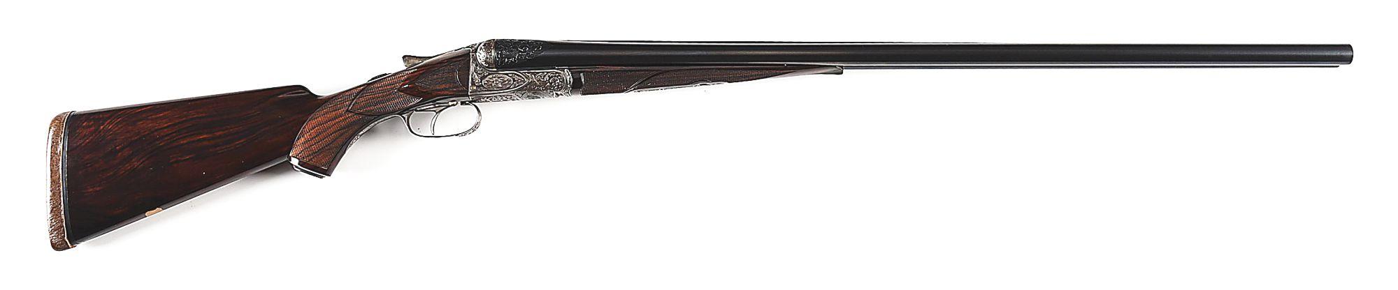 (C) CASED A.H. FOX XE GRADE 12 BORE SIDE BY SIDE SHOTGUN.