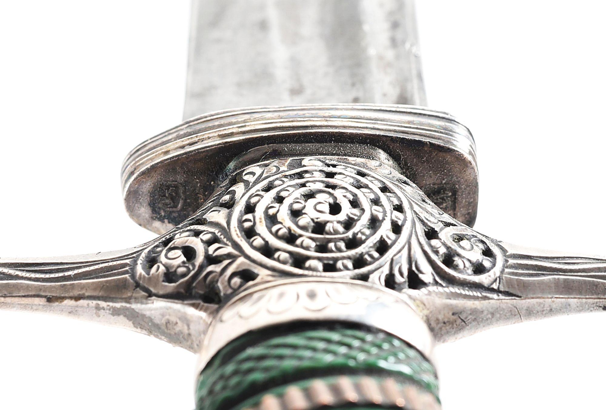 SILVER-HILTED EAGLE HEAD POMMEL SWORD WITH SCABBARD.