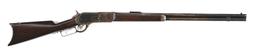 (A) WINCHESTER MODEL 1876 OPEN TOP LEVER ACTION RIFLE.