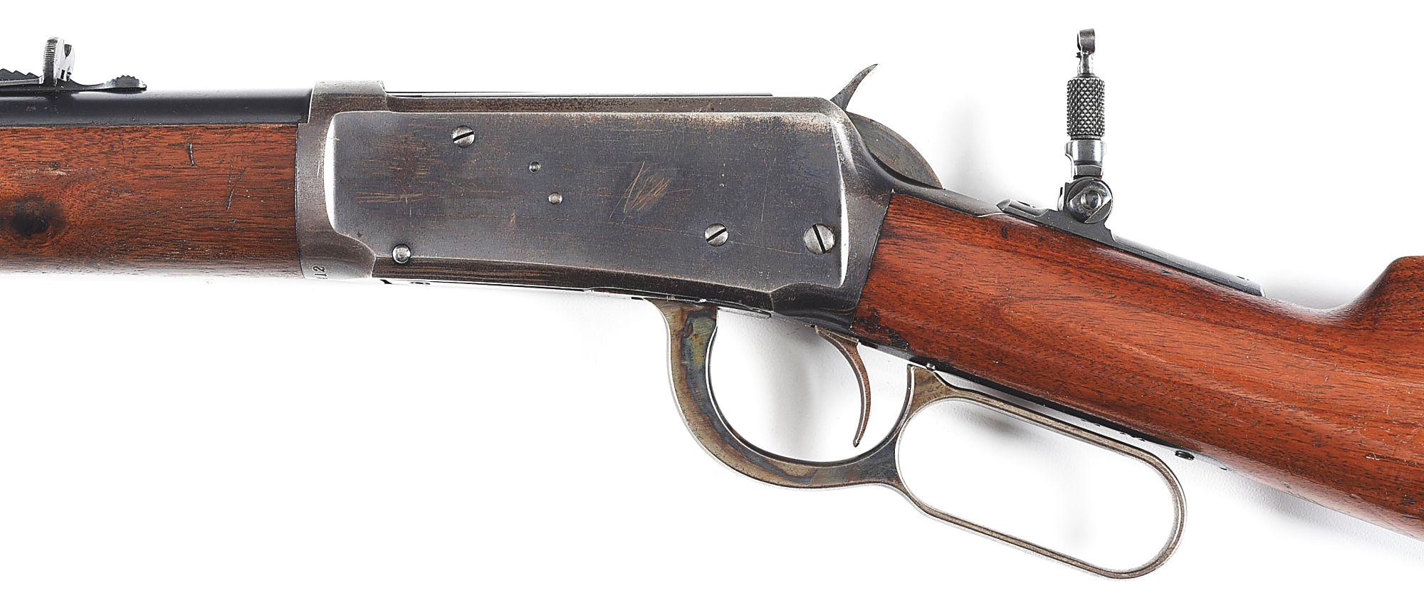 (C) WINCHESTER MODEL 1894 LEVER ACTION RIFLE WITH SWISS BUTT PLATE.