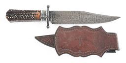 CAS DAMASCUS BLADE BOWIE KNIFE WITH TOOLED LEATHER SCABBARD.