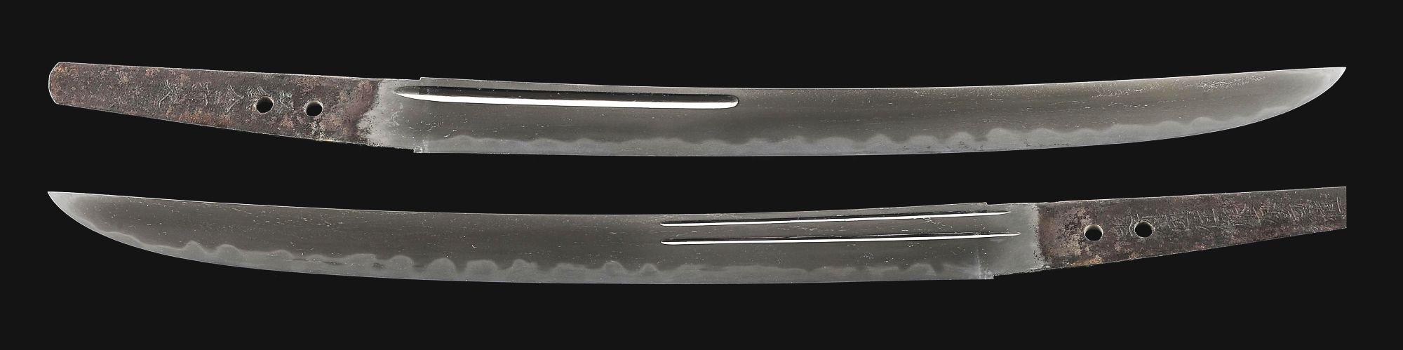 A LARGE TANTO SIGNED BY ECHIZEN KANETANE, WITH AN UNUSUAL INSCRIPTION REGARDING FORGING, IN KOSHIRAE