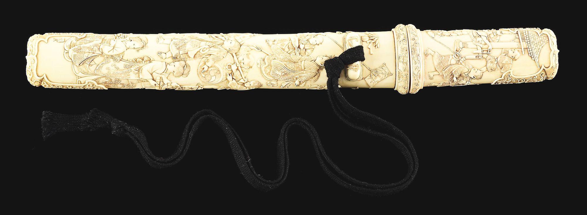 AN UNUSUALLY GOOD QUALITY IVORY MOUNTED TANTO.