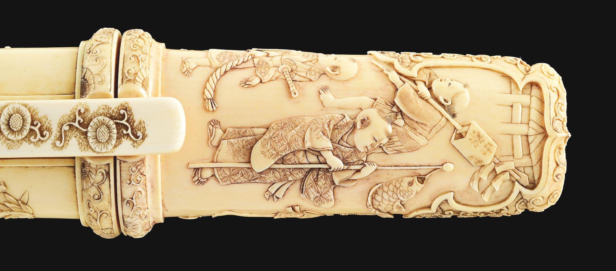 AN UNUSUALLY GOOD QUALITY IVORY MOUNTED TANTO.