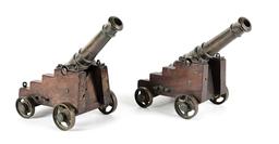 PAIR OF SIGNAL CANNONS ON CARRIAGES