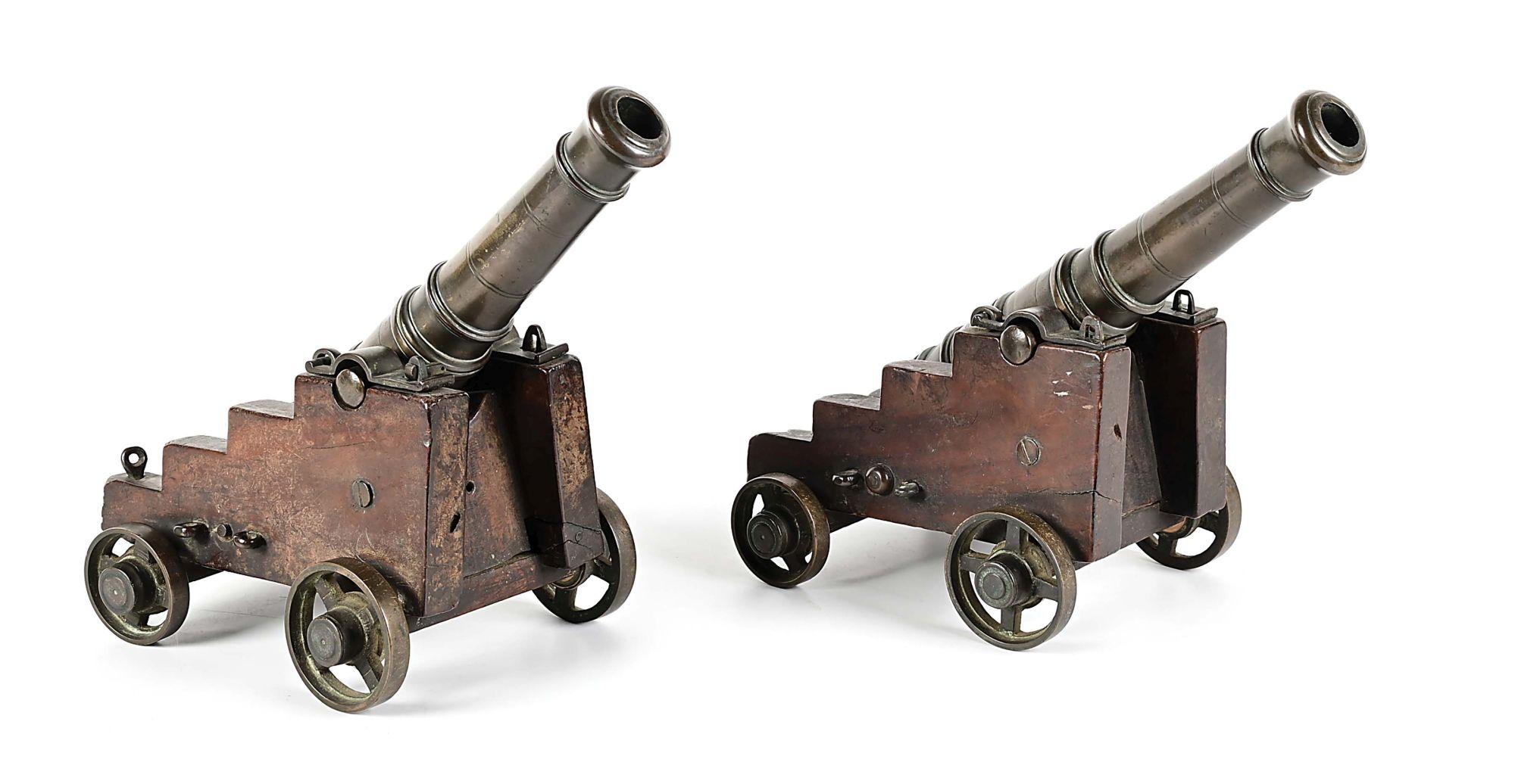 PAIR OF SIGNAL CANNONS ON CARRIAGES