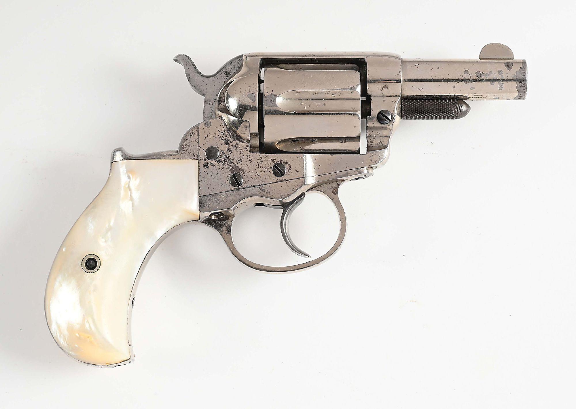 (A) COLT MODEL 1877 DOUBLE ACTION REVOLVER.