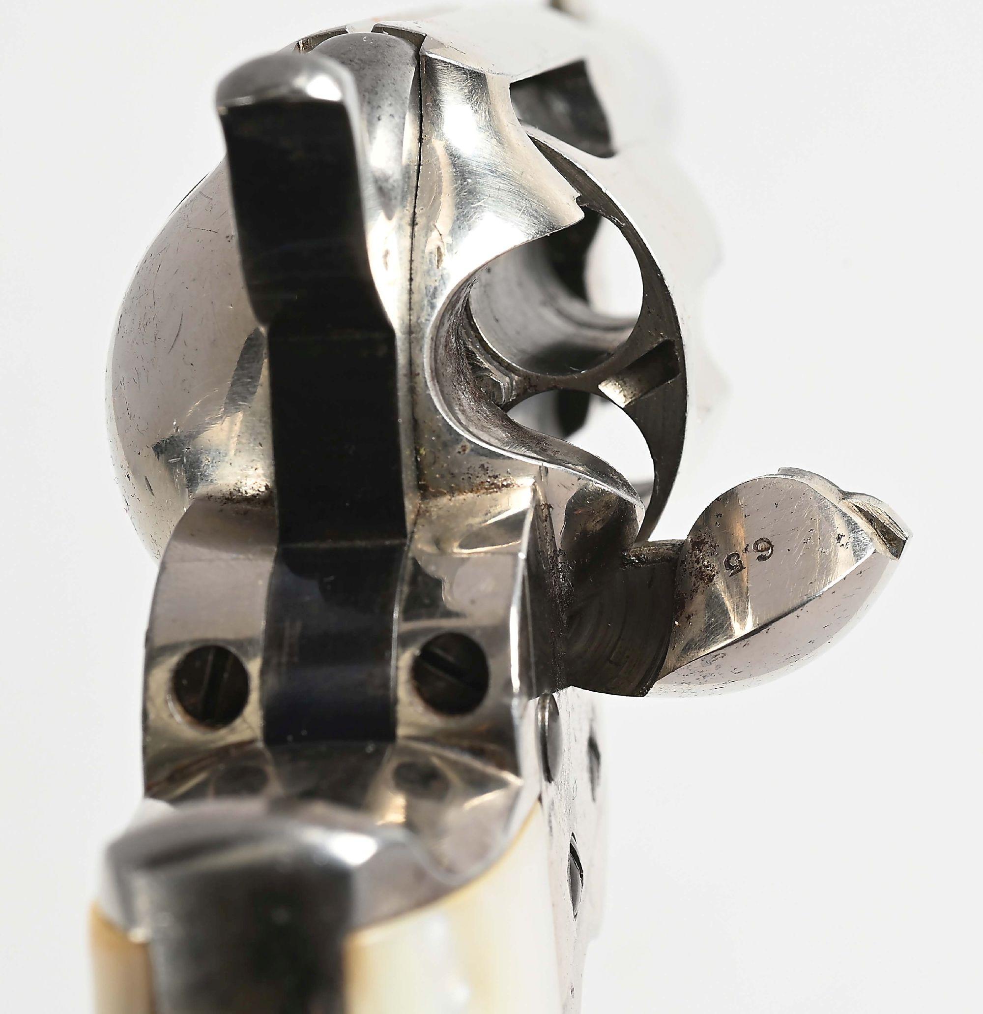 (A) COLT MODEL 1877 DOUBLE ACTION REVOLVER.