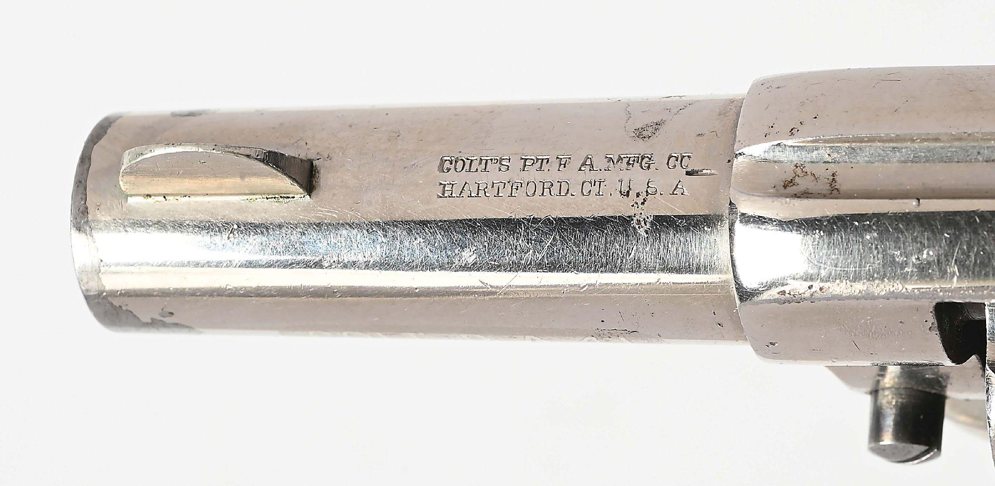 (A) COLT MODEL 1877 DOUBLE ACTION REVOLVER.