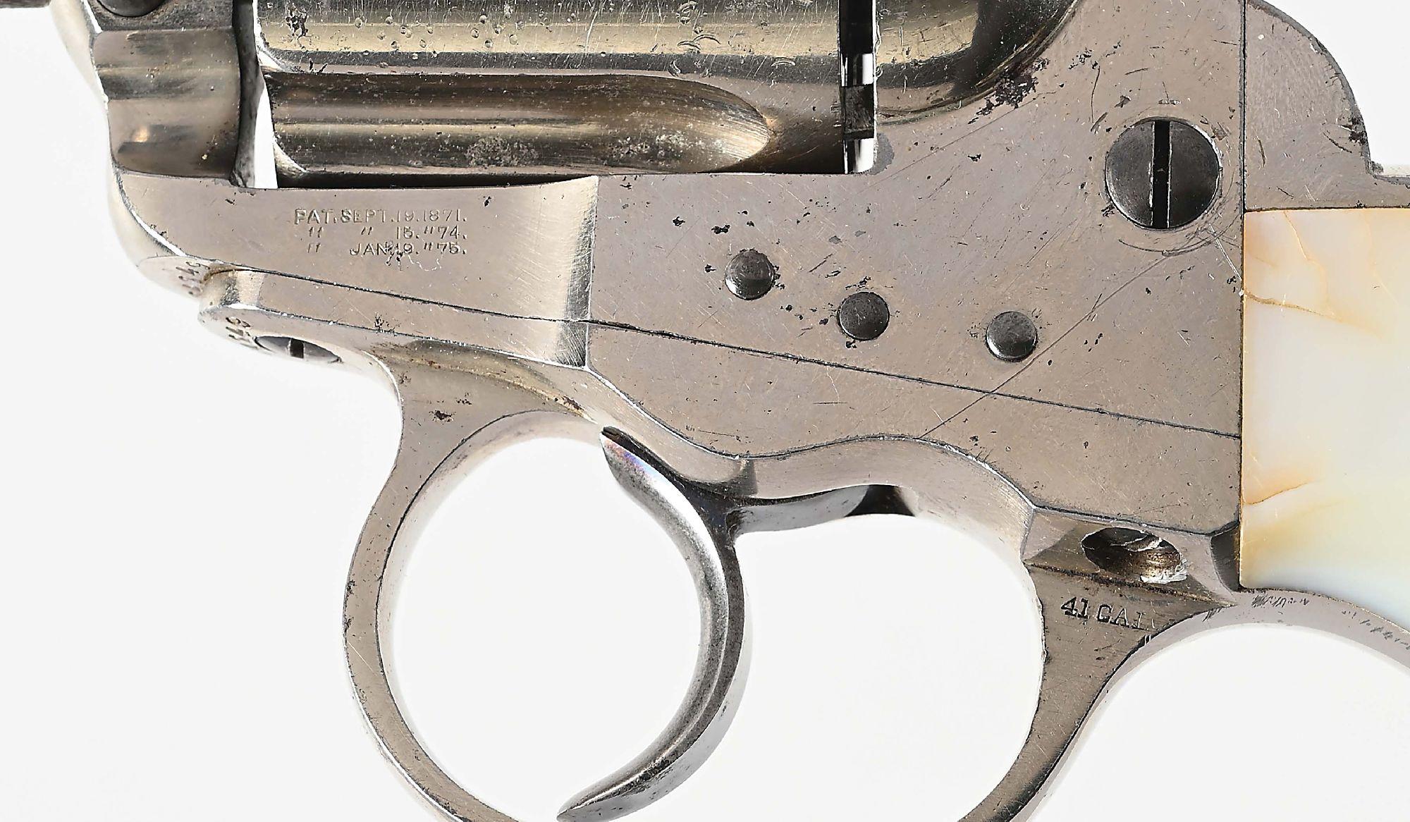 (A) COLT MODEL 1877 DOUBLE ACTION REVOLVER.
