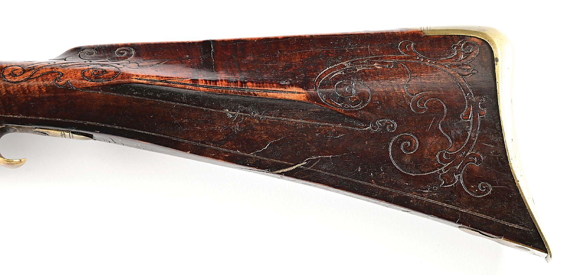 (A) BUCKS COUNTY FLINTLOCK KENTUCKY RIFLE ATTRIBUTED TO JOHN SHULER.