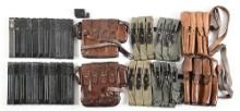LARGE LOT OF MP40 MAGAZINES AND POUCHES.