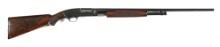 (C) WINCHESTER MODEL 42 DELUXE SLIDE ACTION SHOTGUN.
