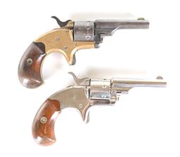 (A) LOT OF 2 COLT OPEN TOP POCKET MODEL SINGLE ACTION REVOLVERS.