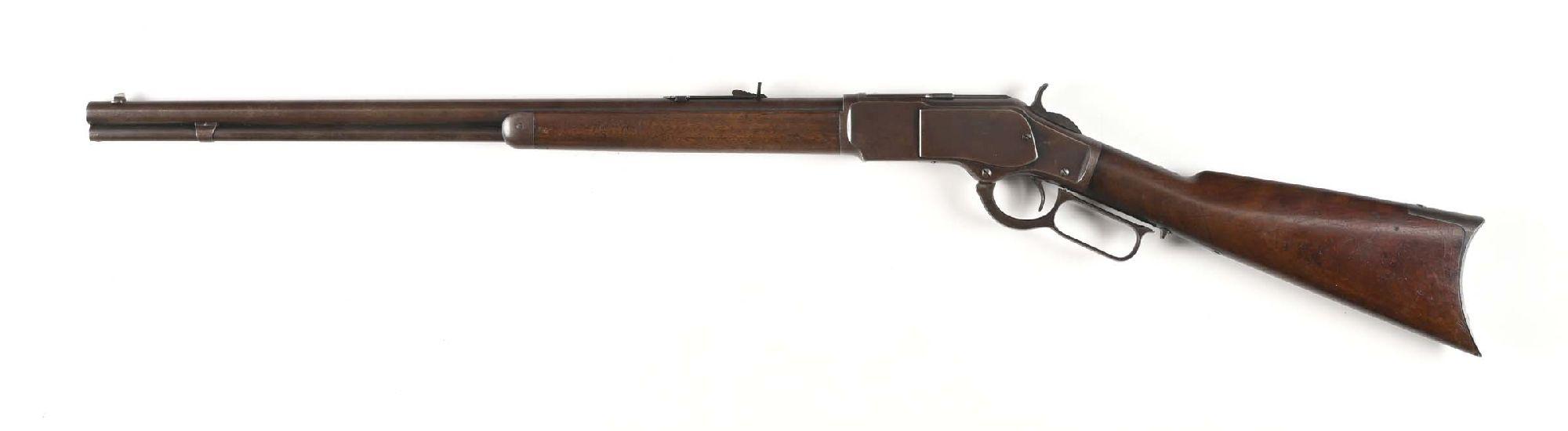 (A) WINCHESTER MODEL 1873 LEVER ACTION RIFLE (1884).