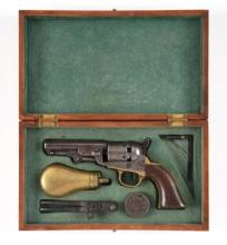 (A) CASED COLT MODEL 1849 POCKET PERCUSSION REVOLVER (1866).