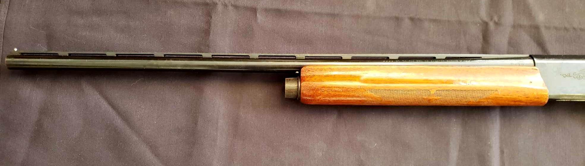 Remington Model 1100, 20 gauge, Semi Automatic, 24" barrel