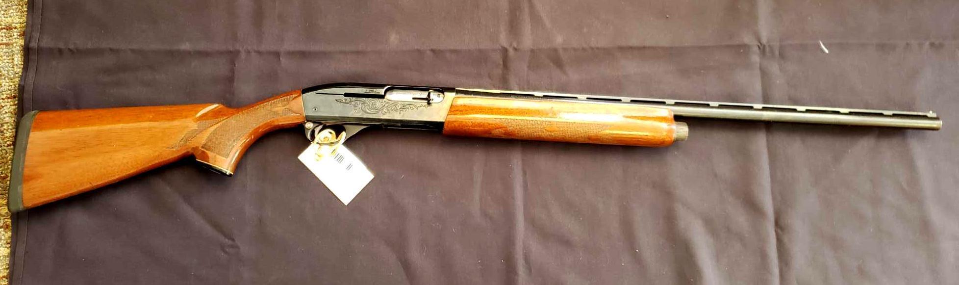 Remington Model 1100, 20 gauge, Semi Automatic, 24" barrel