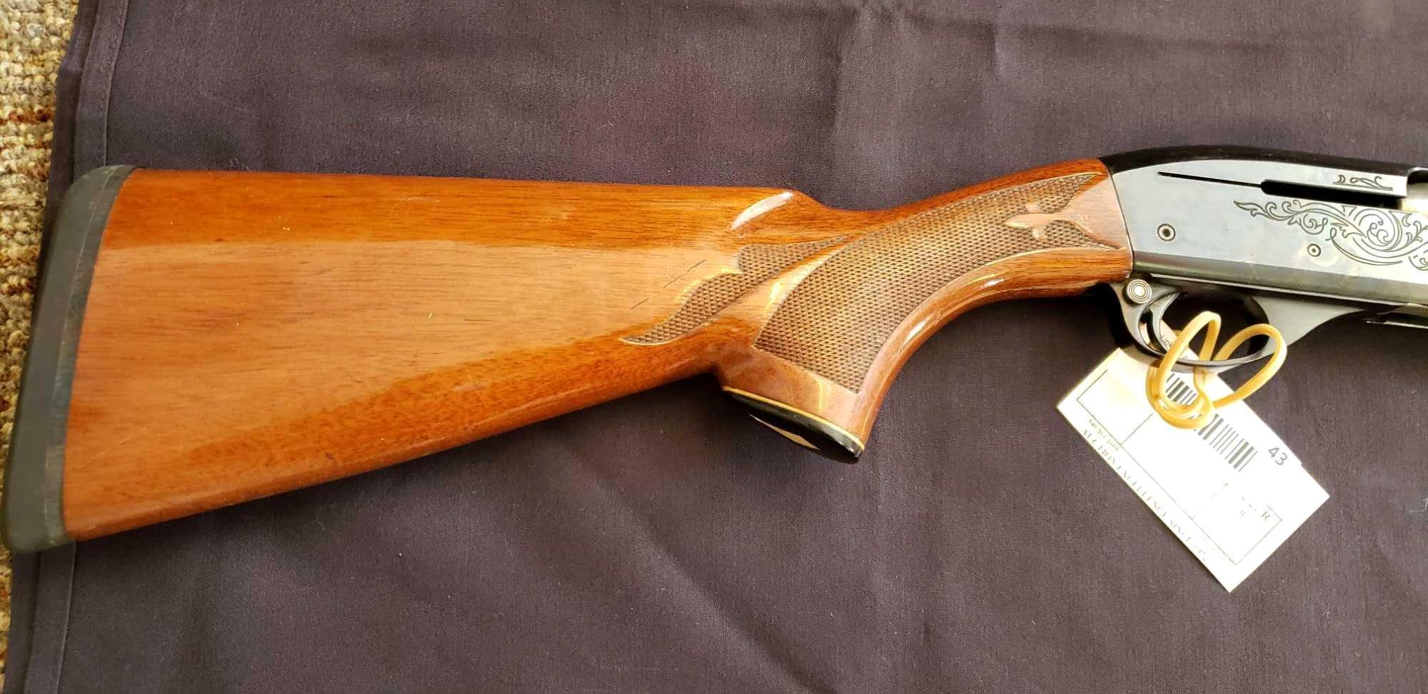 Remington Model 1100, 20 gauge, Semi Automatic, 24" barrel
