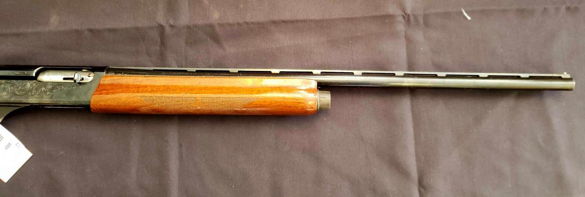 Remington Model 1100, 20 gauge, Semi Automatic, 24" barrel