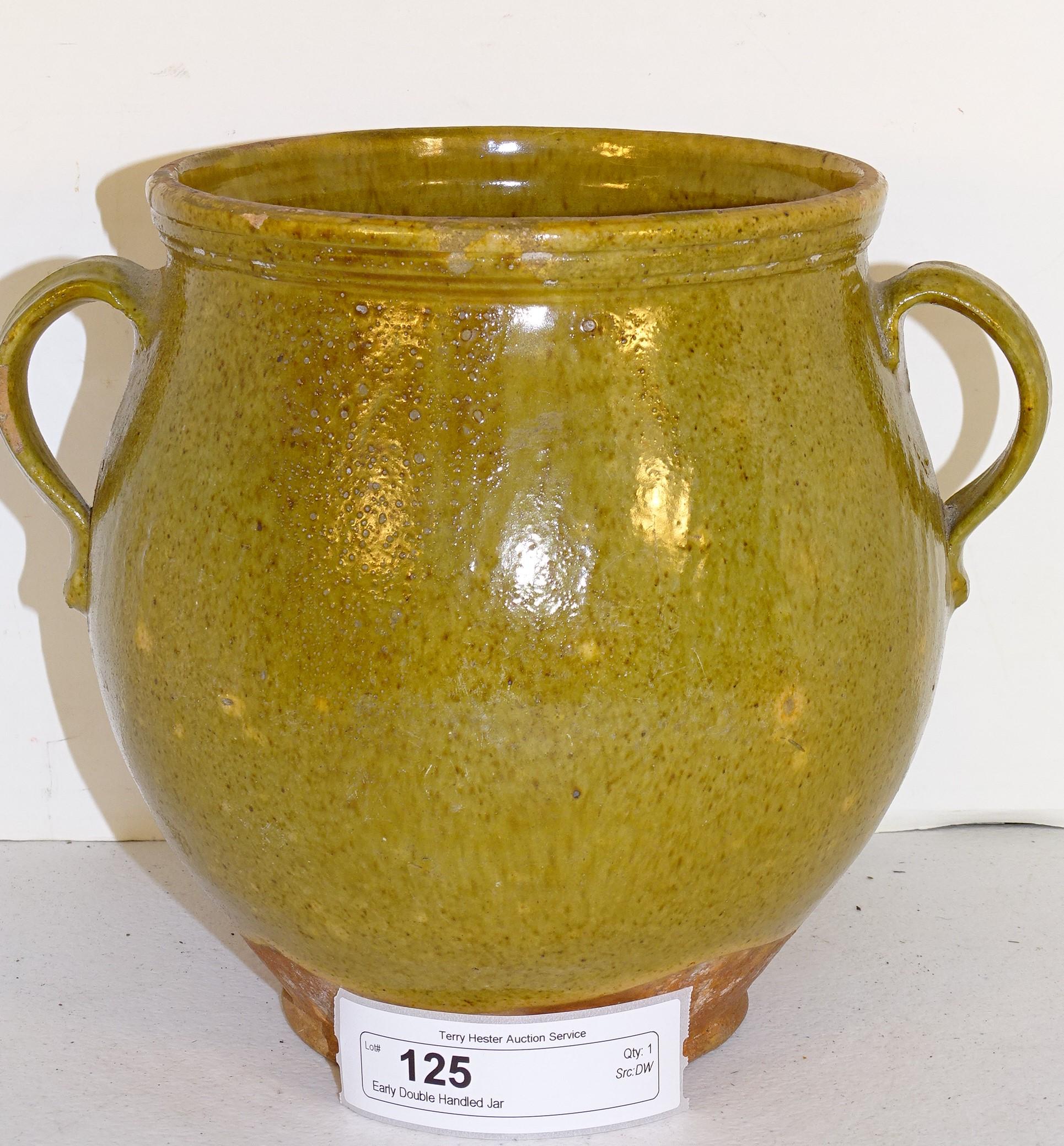 Early Double Handled Pottrery Jar