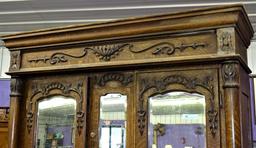 CIRCA 1900'S DOUBLE OAK WARDROBE W/BEVEL MIRRORS