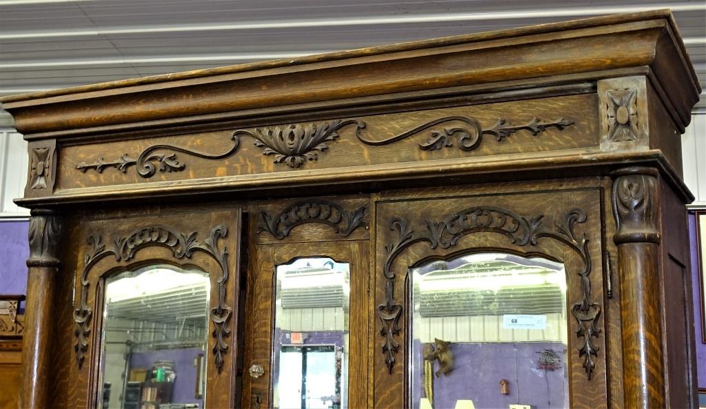 CIRCA 1900'S DOUBLE OAK WARDROBE W/BEVEL MIRRORS