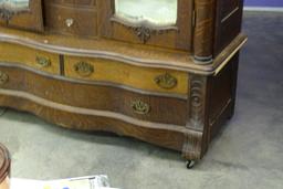 CIRCA 1900'S DOUBLE OAK WARDROBE W/BEVEL MIRRORS