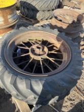 2159-(2) JOHN DEERE 12-SPLINE ROUND SPOKE WHEELS w/ 12-36 TIRES