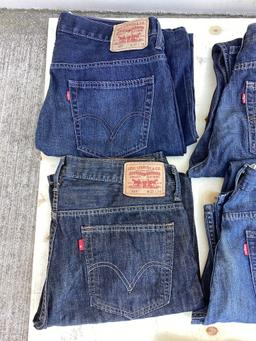 Box lot of assorted Levi jeans