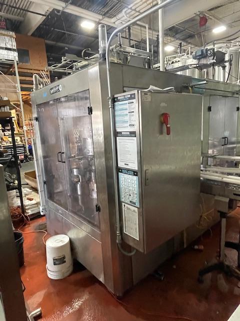 Palmer Rotary 12 Head Can Filler and DePalletizer