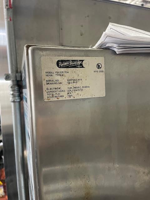 Palmer Rotary 12 Head Can Filler and DePalletizer