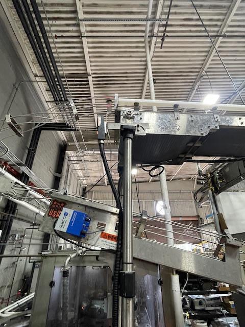 Palmer Rotary 12 Head Can Filler and DePalletizer