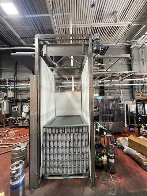 Palmer Rotary 12 Head Can Filler and DePalletizer