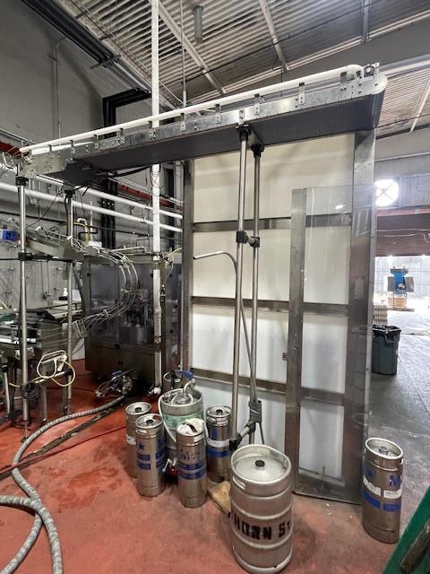 Palmer Rotary 12 Head Can Filler and DePalletizer