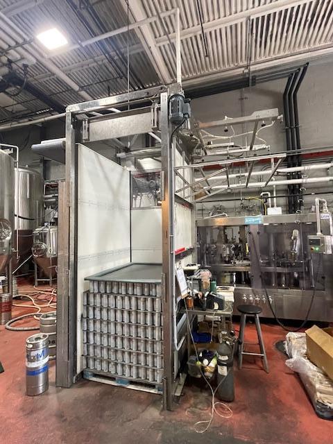 Palmer Rotary 12 Head Can Filler and DePalletizer