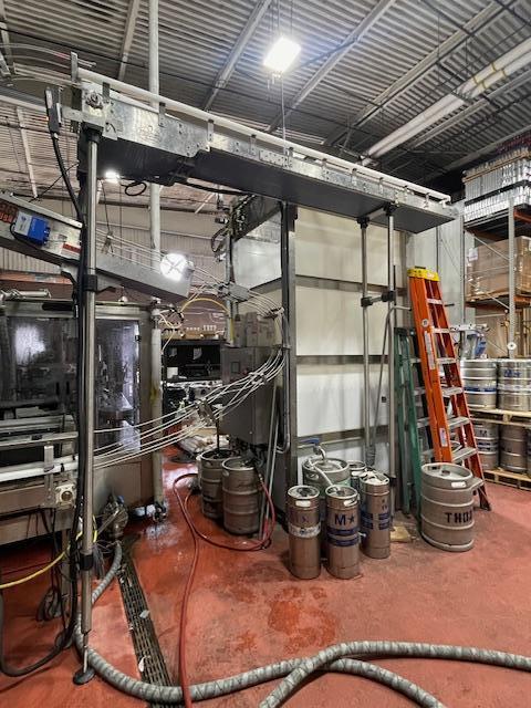 Palmer Rotary 12 Head Can Filler and DePalletizer