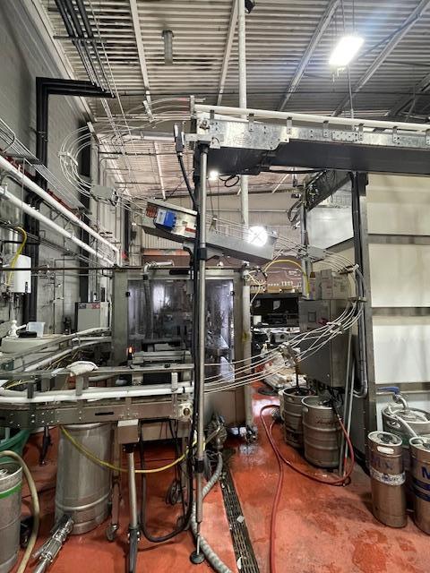 Palmer Rotary 12 Head Can Filler and DePalletizer