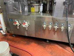 Palmer Rotary 12 Head Can Filler and DePalletizer