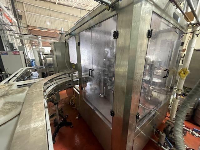 Palmer Rotary 12 Head Can Filler and DePalletizer