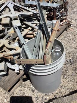 Pallet lot of cyclone fence barb wire post tree