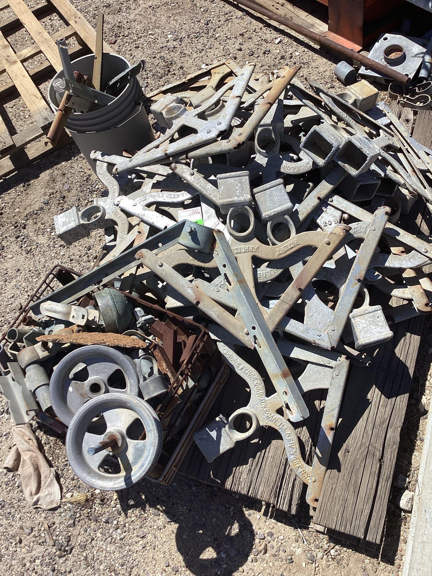 Pallet lot of cyclone fence barb wire post tree